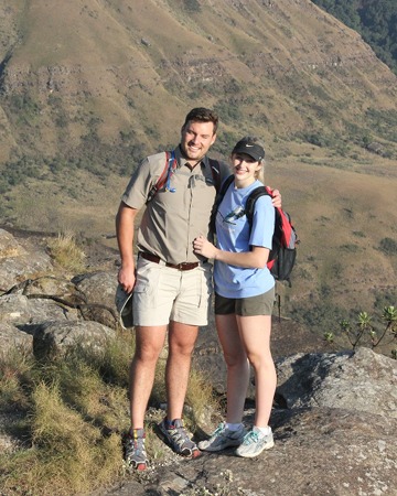 Travellers hiking through a valley